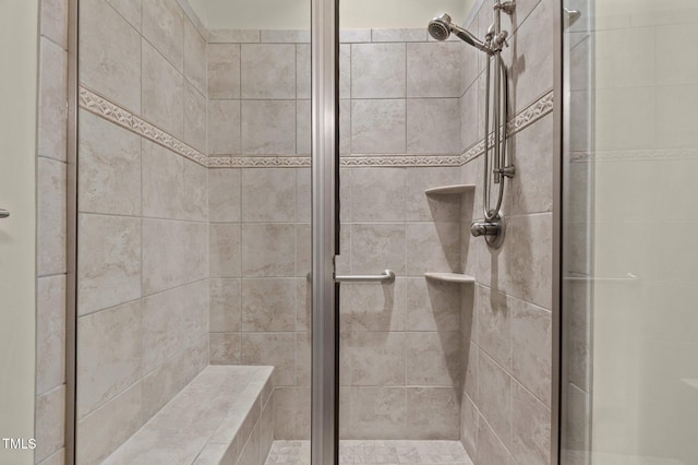 bathroom featuring walk in shower