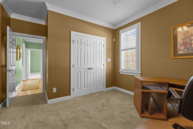 carpeted home office with ornamental molding