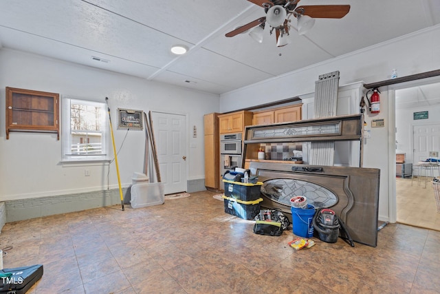 kitchen featuring ceiling fan