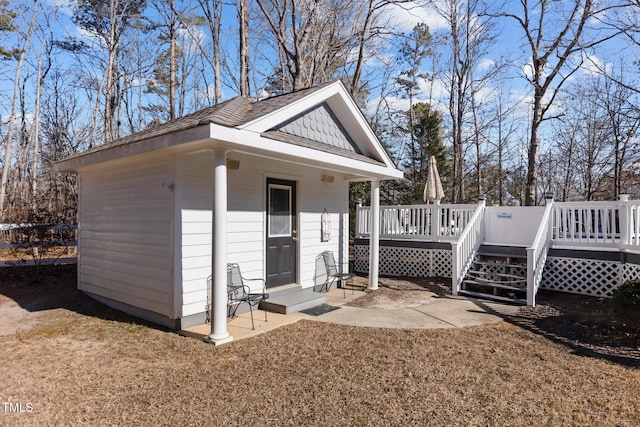 exterior space with a lawn and a deck