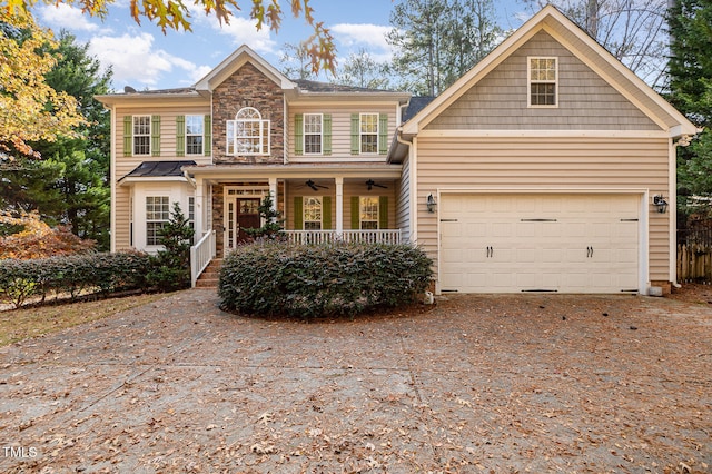 view of front facade featuring ceiling fan and a porch