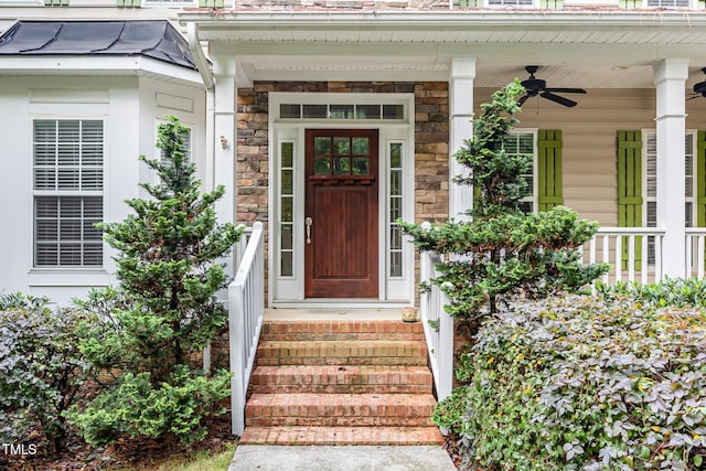 1620 Dunn Rd, Raleigh, NC 27614 - doorway to property with a ceiling fan, stone siding, and a porch