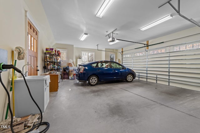 garage featuring a garage door opener