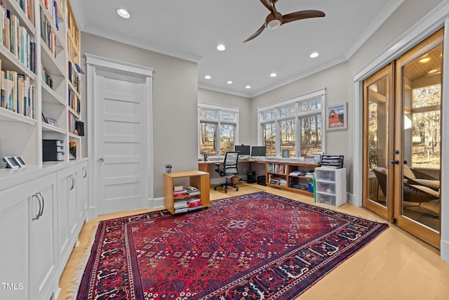 home office featuring crown molding, french doors, and ceiling fan