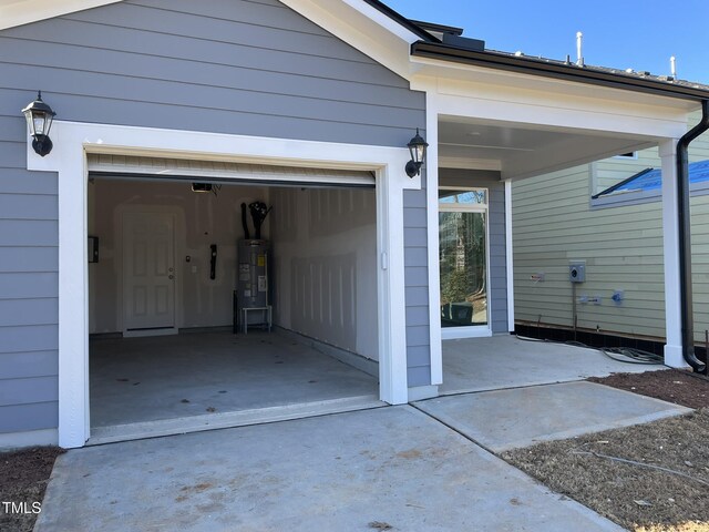 garage with electric water heater