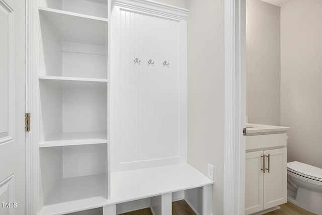 mudroom with wood finished floors