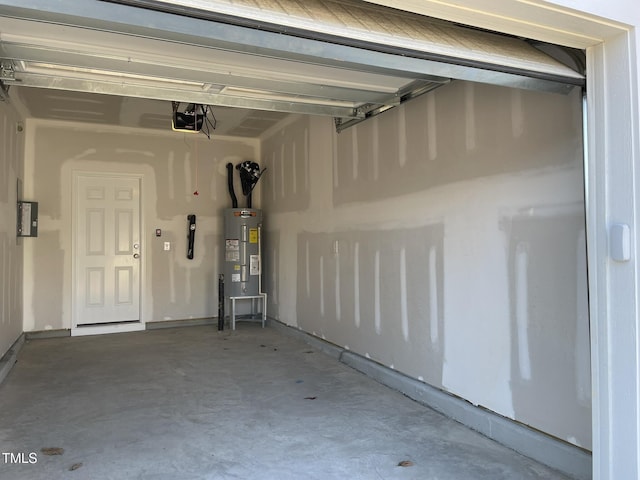 garage with water heater, electric panel, and a garage door opener