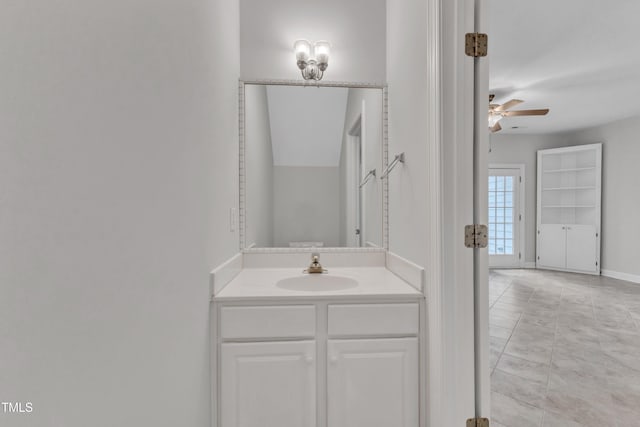 bathroom featuring ceiling fan, tile patterned flooring, and vanity