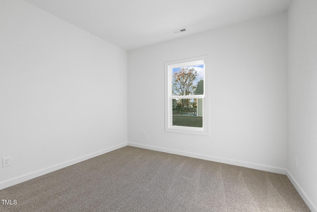 view of carpeted spare room