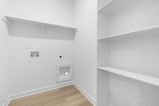 laundry area with hookup for an electric dryer, wood-type flooring, and hookup for a washing machine