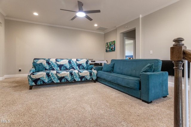 living room with crown molding, carpet, and ceiling fan