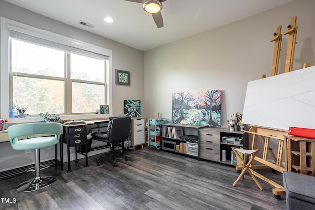 office with dark hardwood / wood-style floors and ceiling fan