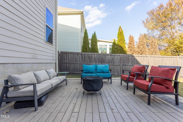 deck with an outdoor hangout area