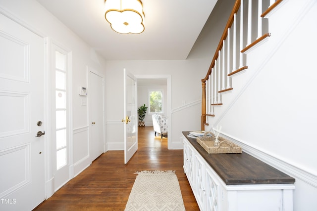 entrance foyer featuring dark hardwood / wood-style floors