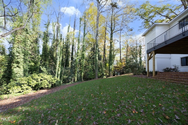 view of yard with a deck