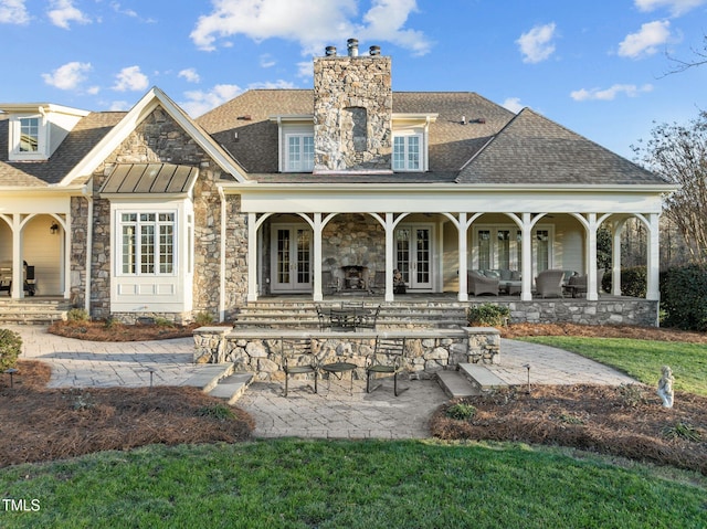 back of house featuring a patio area