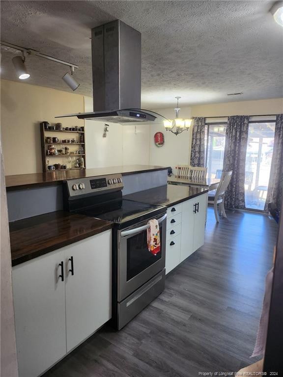 kitchen with white cabinetry, electric range, dark hardwood / wood-style floors, a textured ceiling, and island range hood