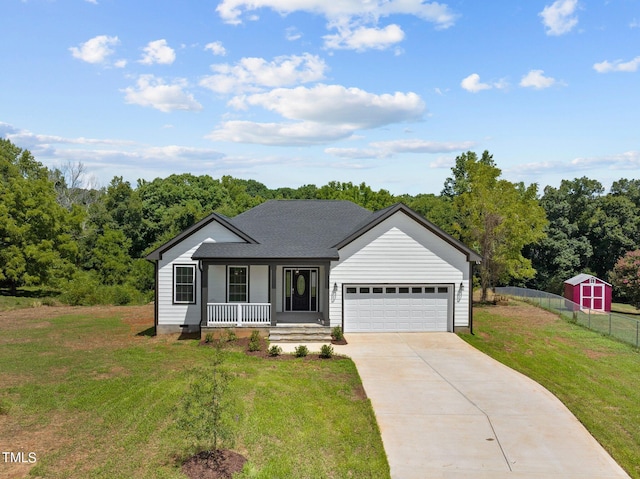 single story home with covered porch, a garage, and a front lawn