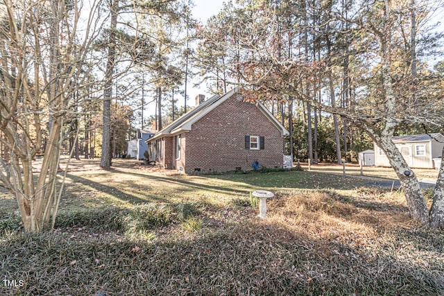 view of property exterior featuring a yard