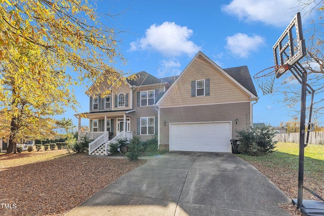 front facade with covered porch, a front yard, and a garage