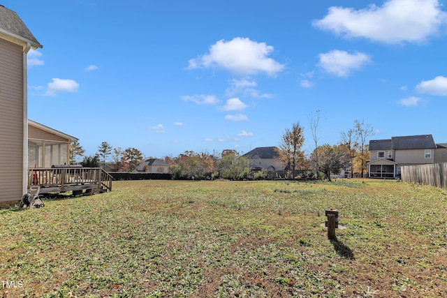 view of yard with a deck