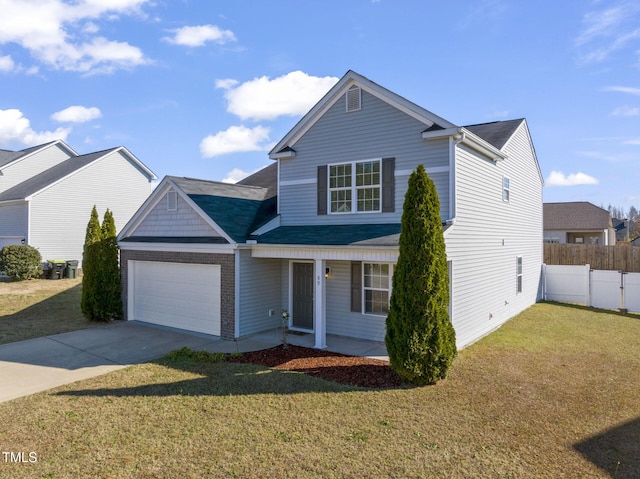 front facade featuring a front yard and a garage