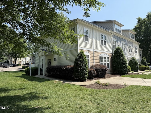 526 Elm Ave, Wake Forest, NC 27587 - view of side of home featuring a yard