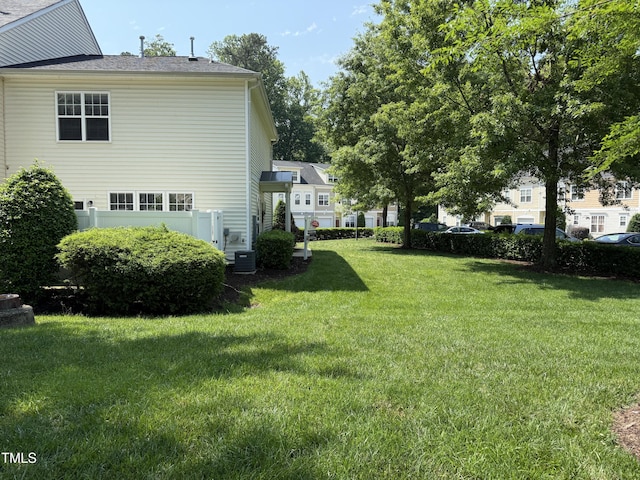 526 Elm Ave, Wake Forest, NC 27587 - view of green lawn with central AC