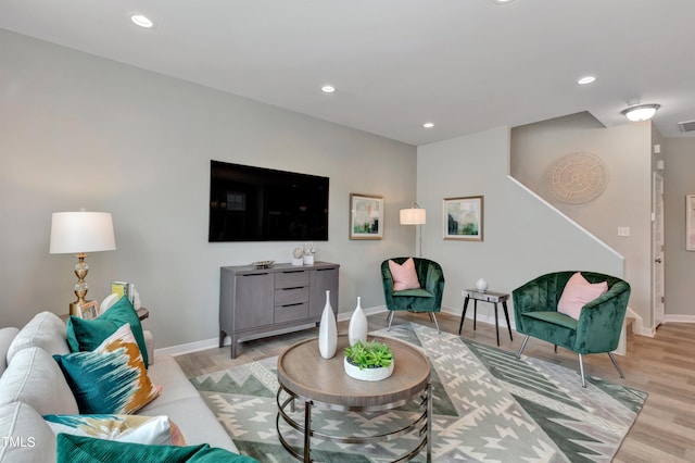 living room with light hardwood / wood-style floors