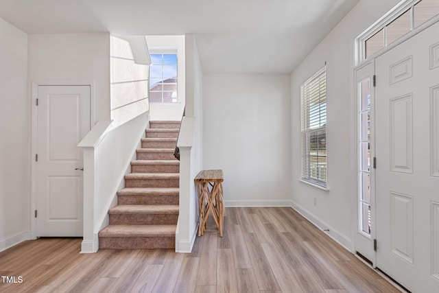 foyer entrance featuring light hardwood / wood-style floors