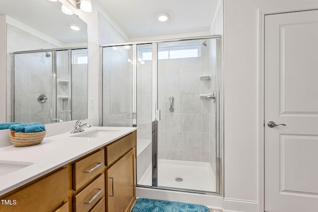 bathroom with vanity and an enclosed shower