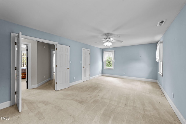 7201 Jonathan Dr, Wendell, NC 27591 - spare room featuring light colored carpet, ceiling fan, and baseboards