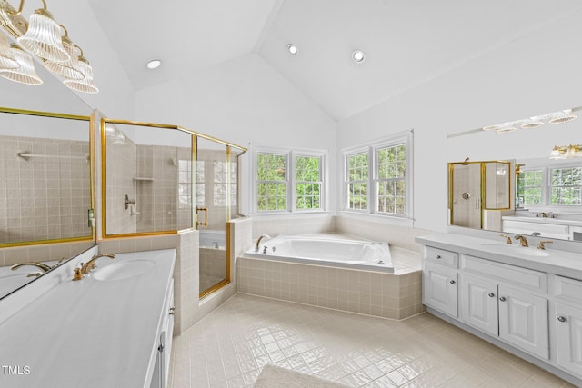 7201 Jonathan Dr, Wendell, NC 27591 - full bathroom featuring a shower stall, a garden tub, a sink, and a healthy amount of sunlight