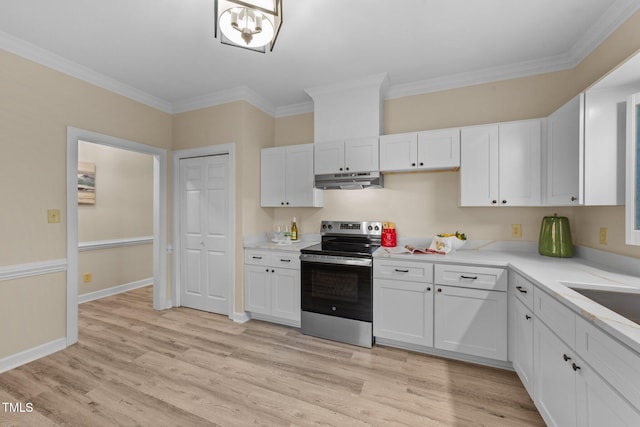 kitchen with white cabinets, electric stove, and ornamental molding