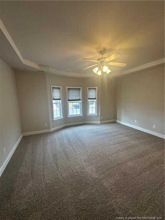 carpeted empty room with ceiling fan