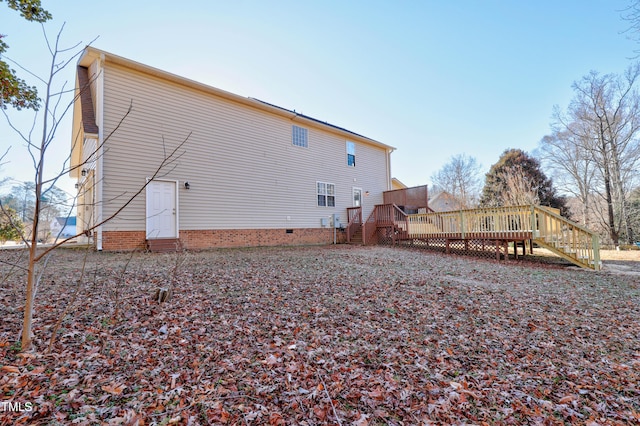 rear view of house with a deck