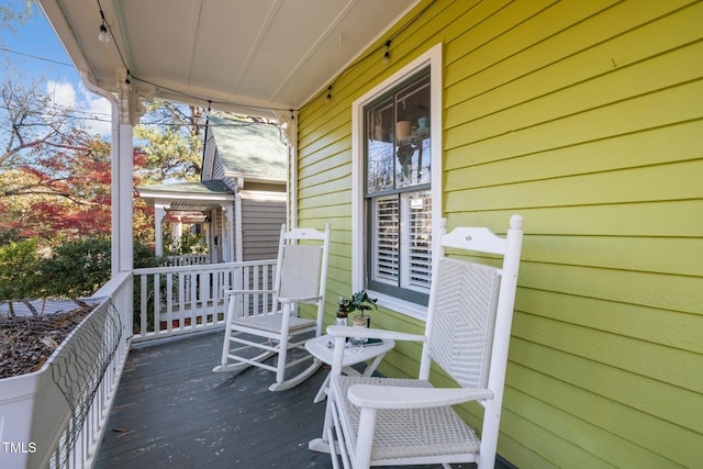 deck with covered porch