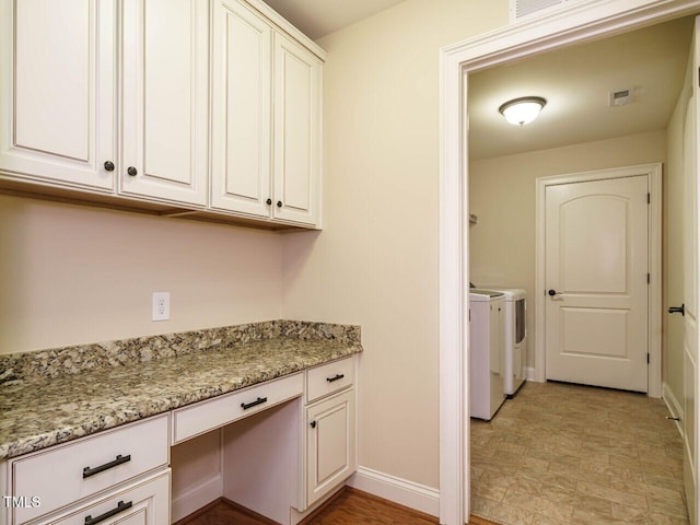 washroom featuring washing machine and dryer