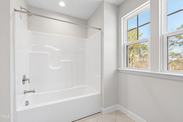 bathroom with washtub / shower combination, tile patterned flooring, baseboards, and recessed lighting