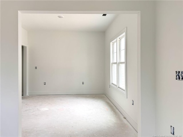 empty room with baseboards