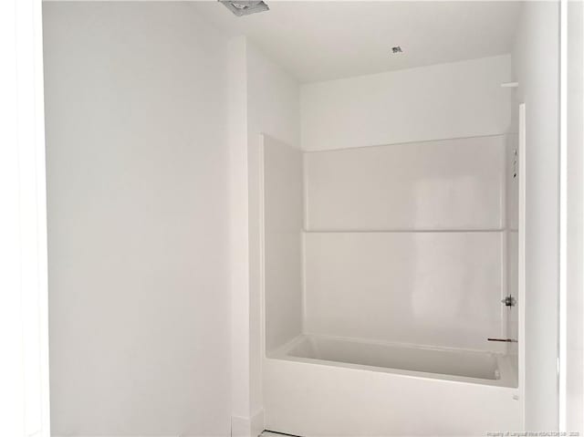 bathroom featuring washtub / shower combination