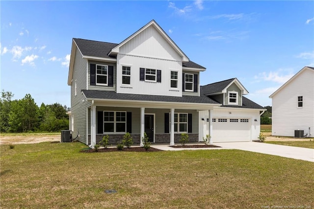 1585 Scull Rd, Raeford, NC 28376 - view of front of property featuring concrete driveway, central AC, a porch, and a front yard