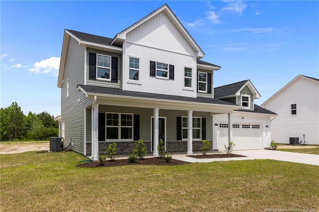 1585 Scull Rd, Raeford, NC 28376 - view of front of property with cooling unit, concrete driveway, covered porch, board and batten siding, and a front lawn