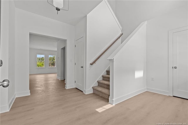 1585 Scull Rd, Raeford, NC 28376 - foyer entrance featuring light wood-type flooring, baseboards, and stairway