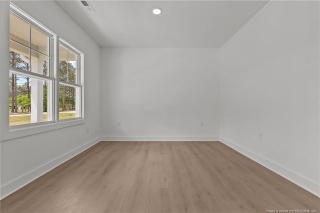 1585 Scull Rd, Raeford, NC 28376 - unfurnished room featuring light wood-type flooring, baseboards, and recessed lighting