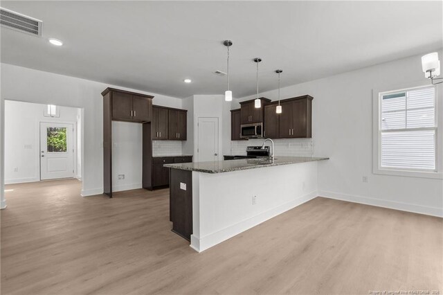 1585 Scull Rd, Raeford, NC 28376 - kitchen featuring stainless steel appliances, light wood-style floors, dark brown cabinetry, and recessed lighting