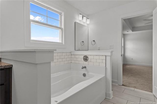 1585 Scull Rd, Raeford, NC 28376 - bathroom with a garden tub, baseboards, tile patterned flooring, and vanity