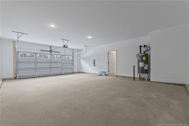 1585 Scull Rd, Raeford, NC 28376 - garage with water heater, recessed lighting, a garage door opener, and baseboards