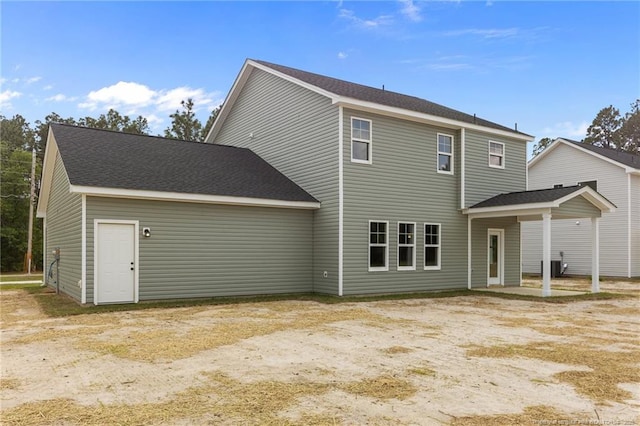 1585 Scull Rd, Raeford, NC 28376 - rear view of house with central AC unit