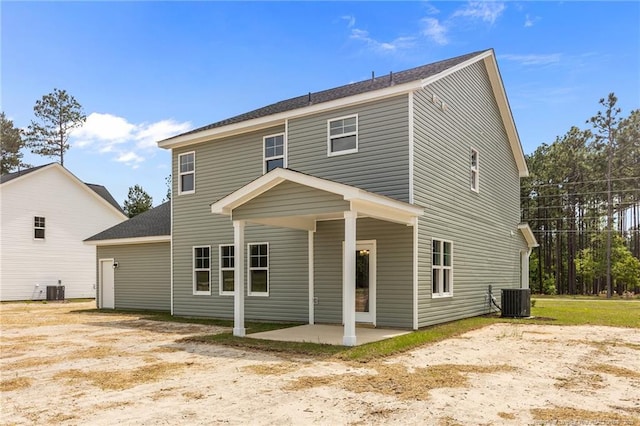 1585 Scull Rd, Raeford, NC 28376 - back of house with cooling unit and a patio area